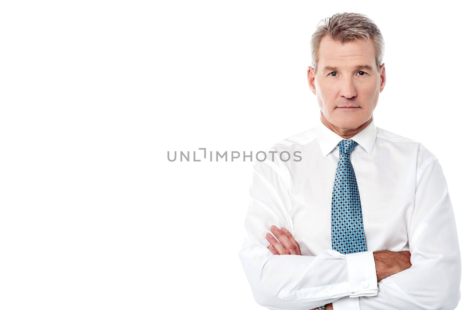 Image of a elder businessman with crossed arms
