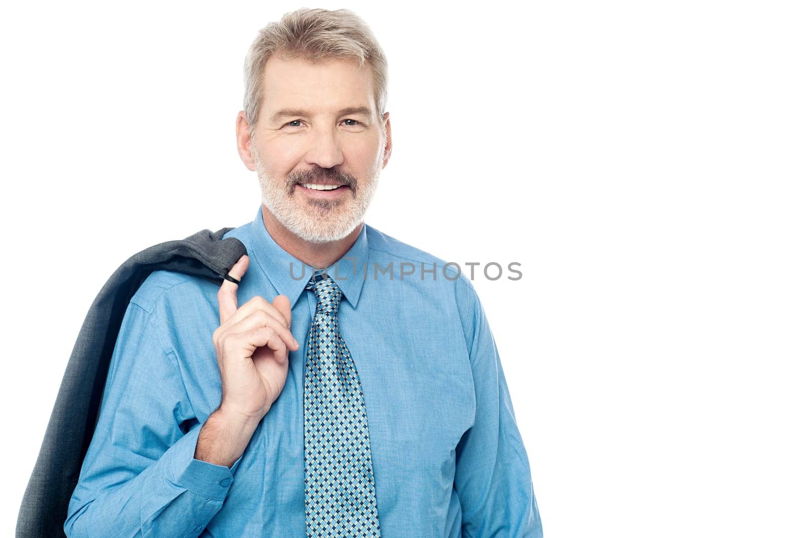Senior businessman with coat over his shoulder