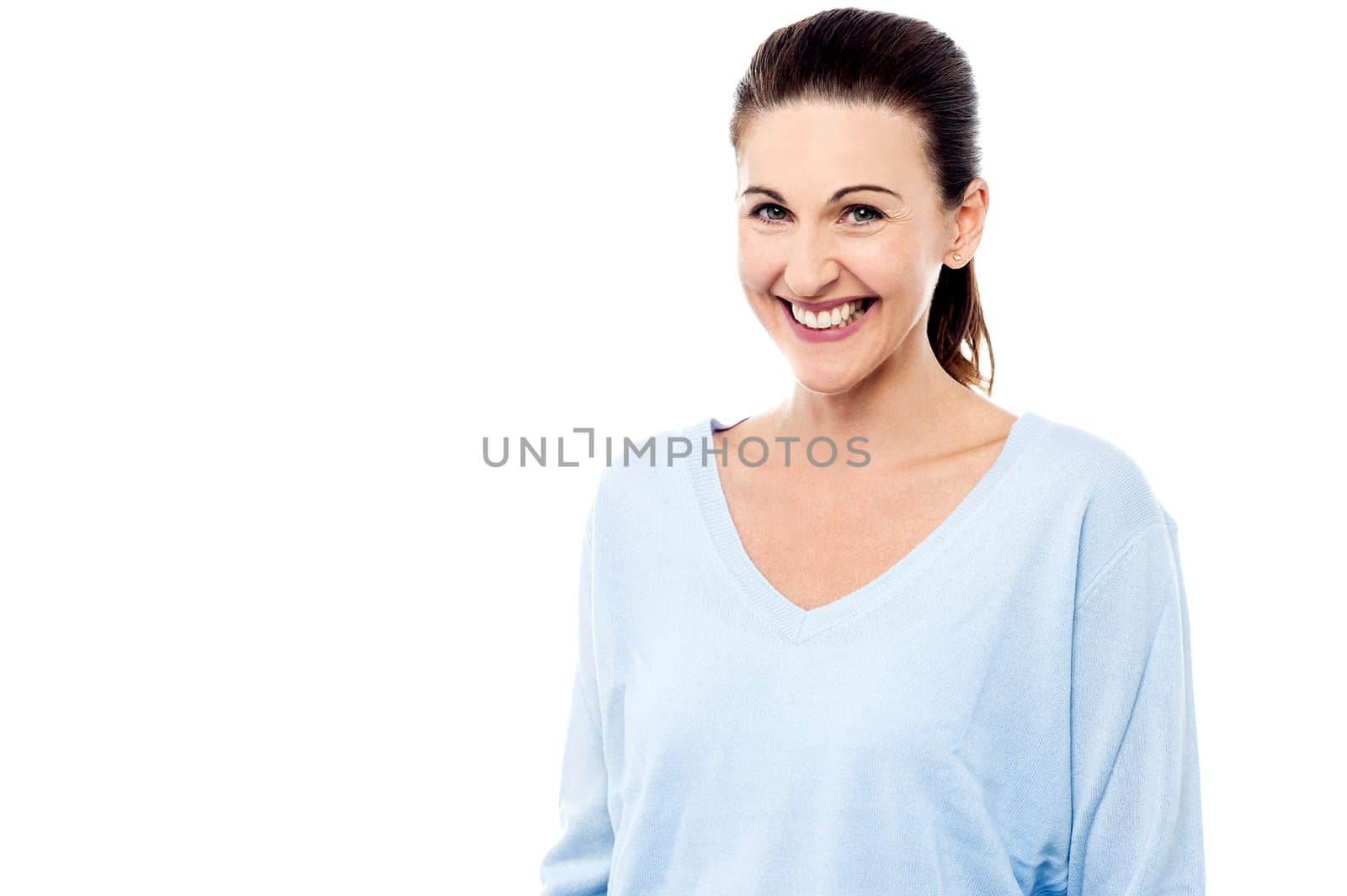 Pretty woman facing towards camera and smiling