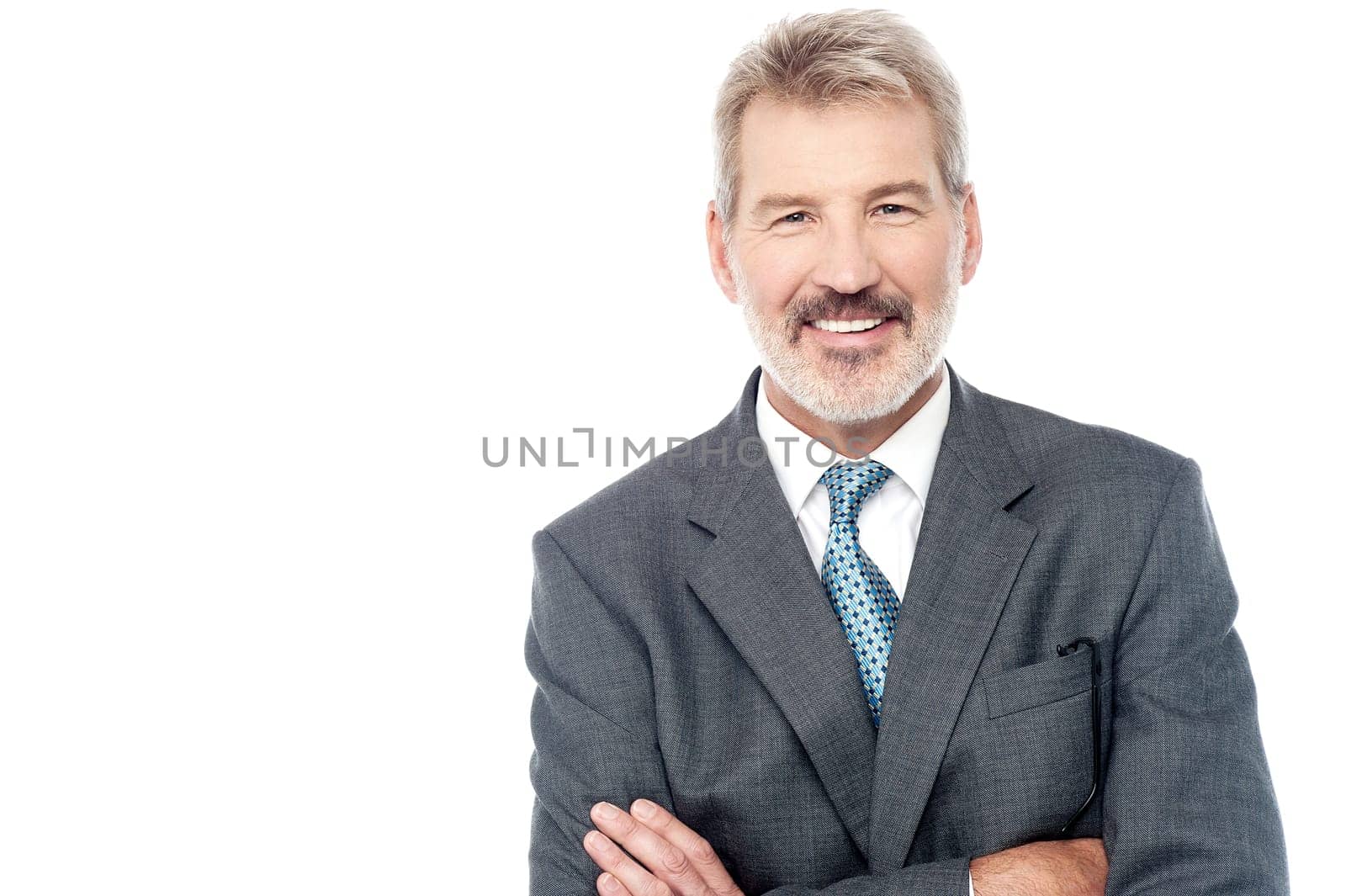 Senior businessman posing confidently