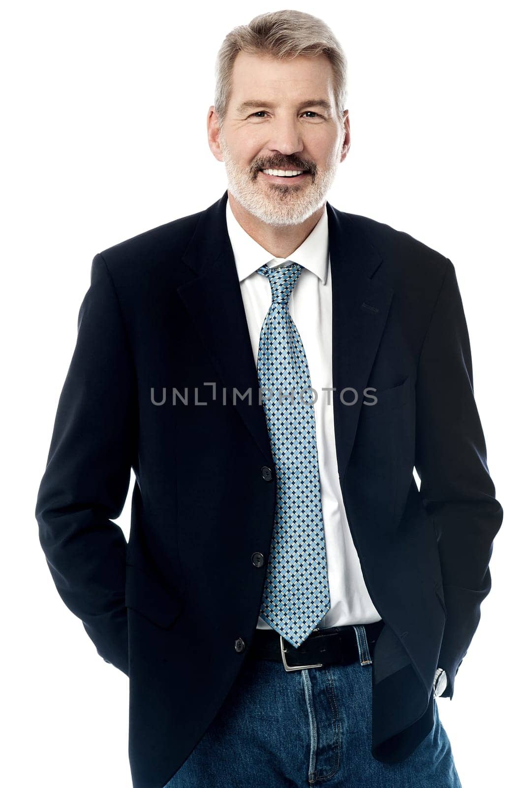 Image of a elder businessman with his hands in pockets