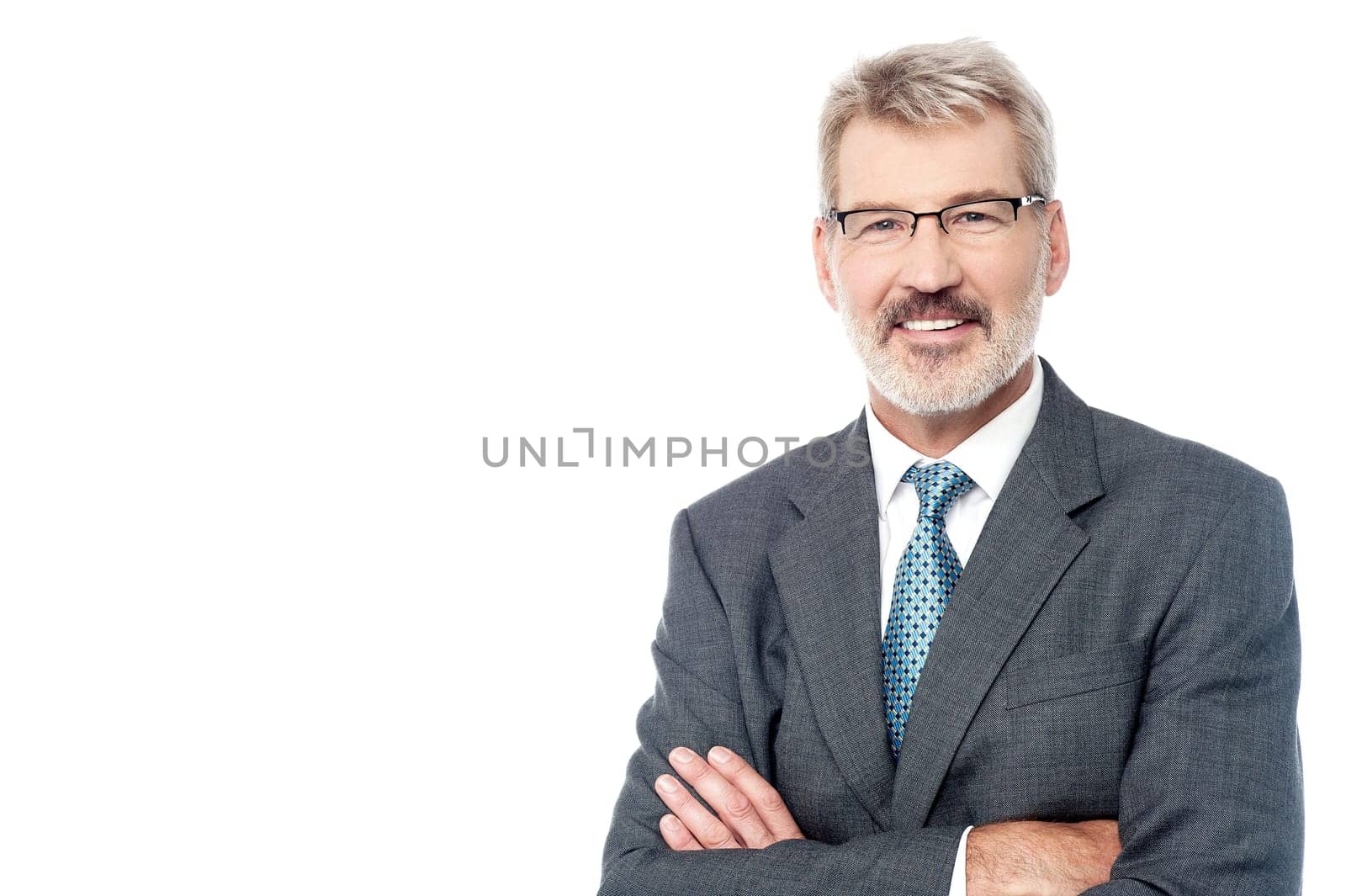 Happy aged posing over white with crossed arms