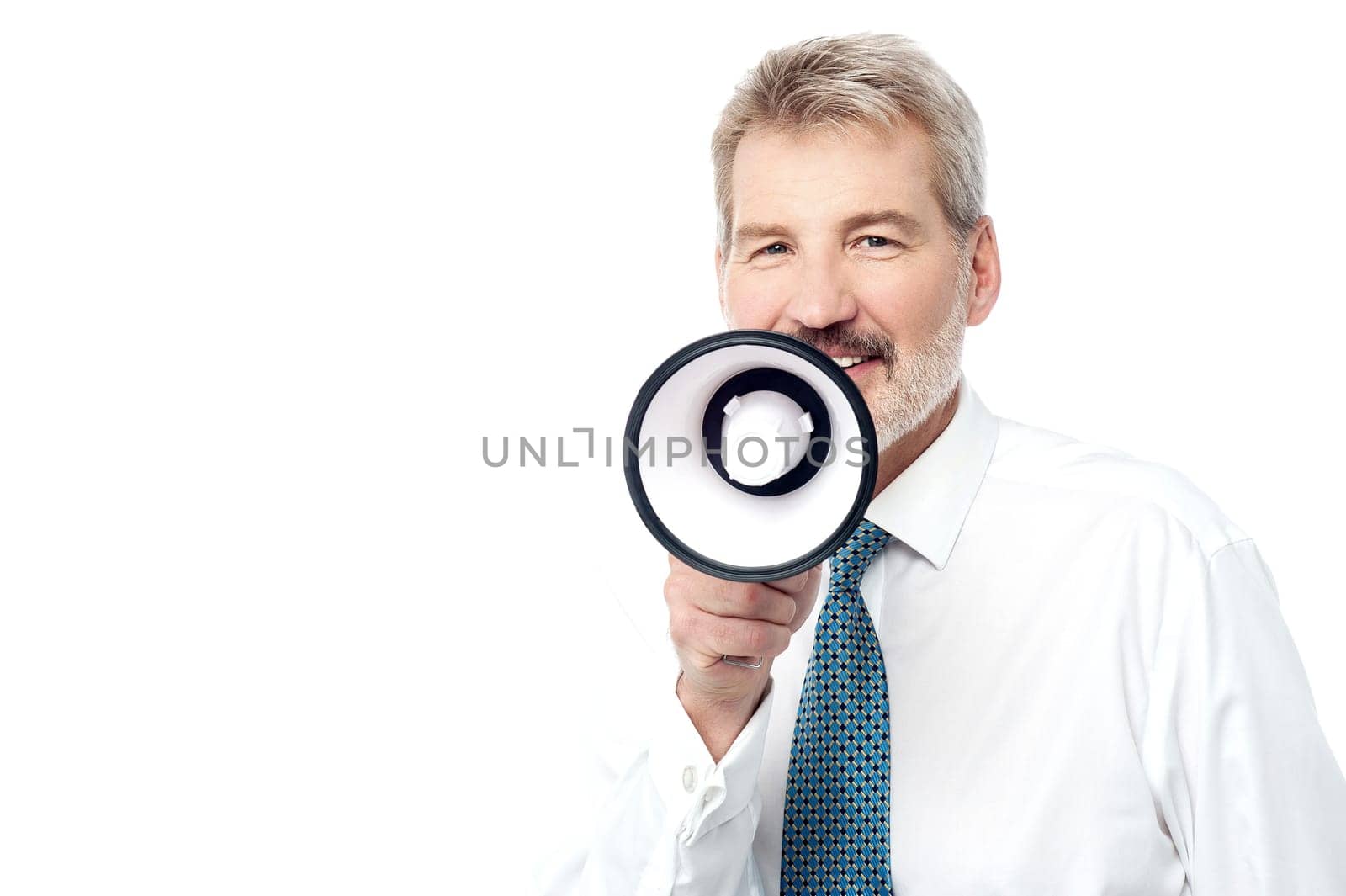 Senior business executive talking on a loudhailer