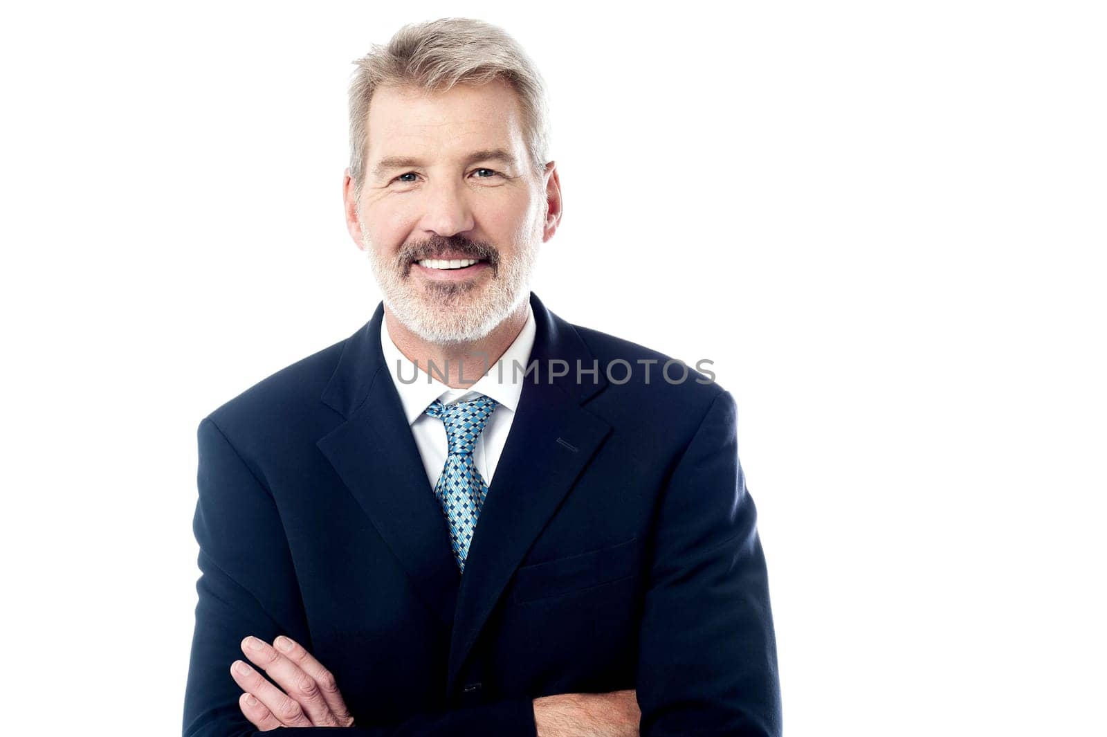 Elderly businessman posing to camera over white