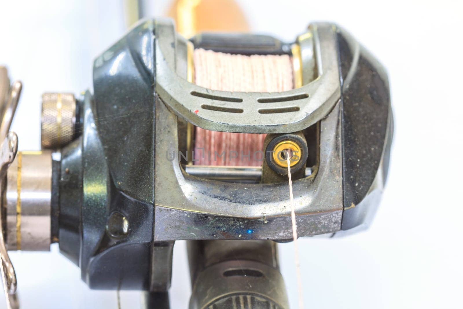 close up Baitcasting reel isolated on white background