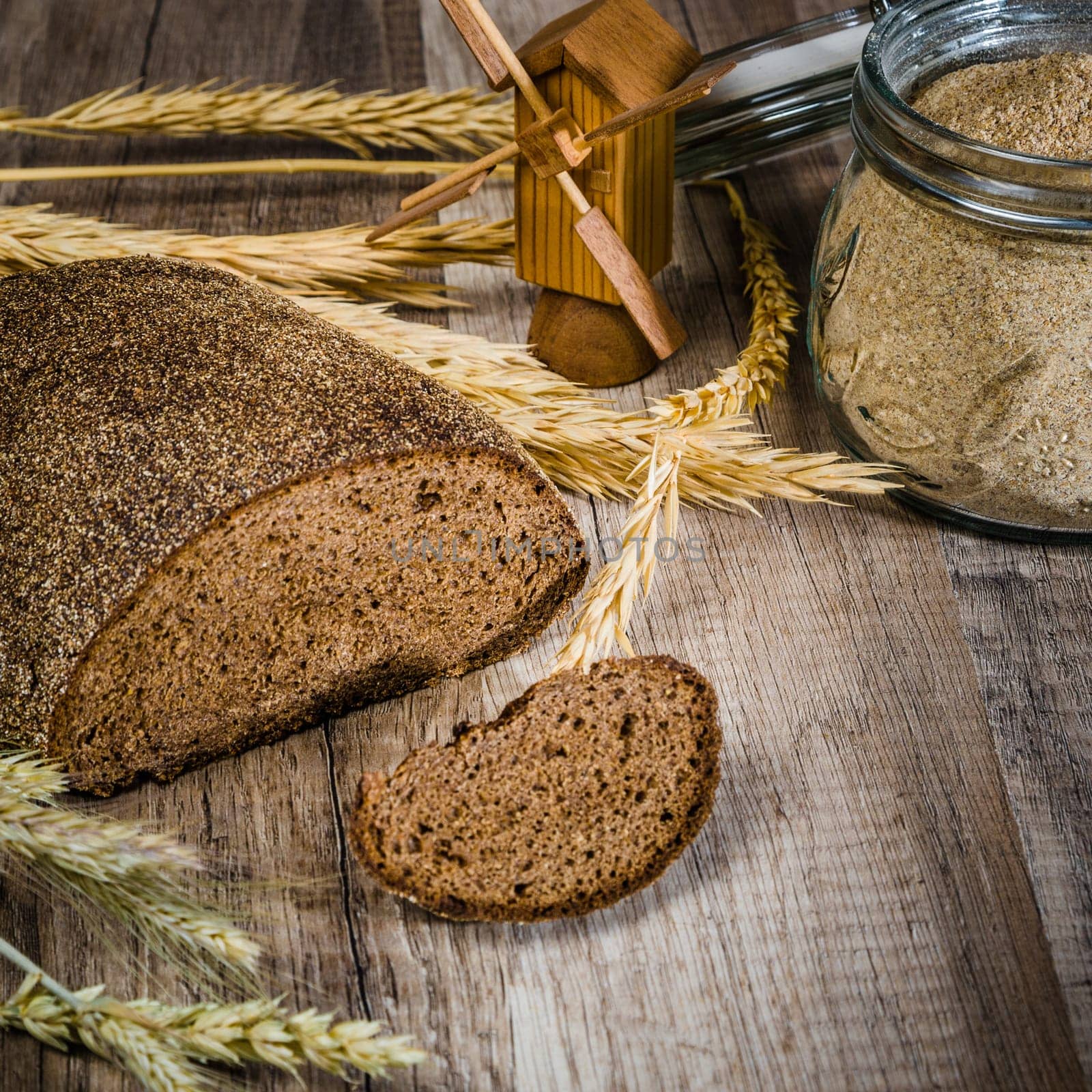Black homemade bread and rye cones, close-up