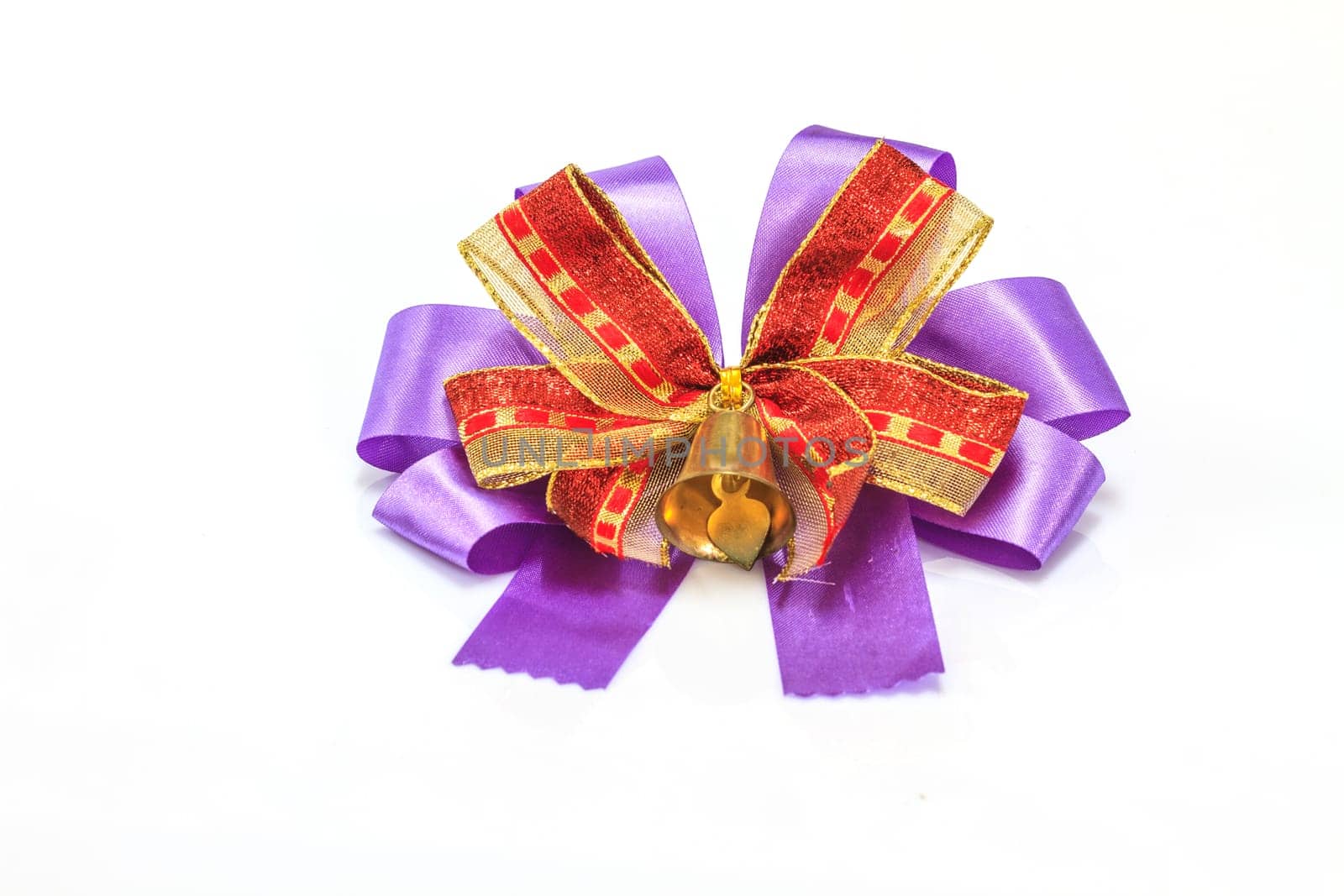 bell and ribbon with bow isolated on white