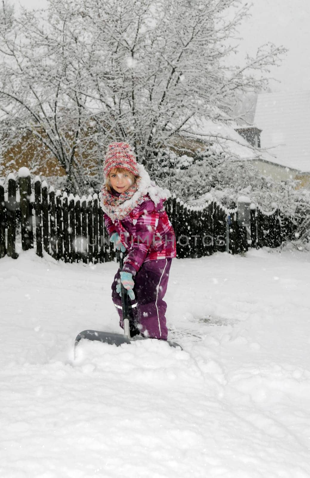 Child with snow slider