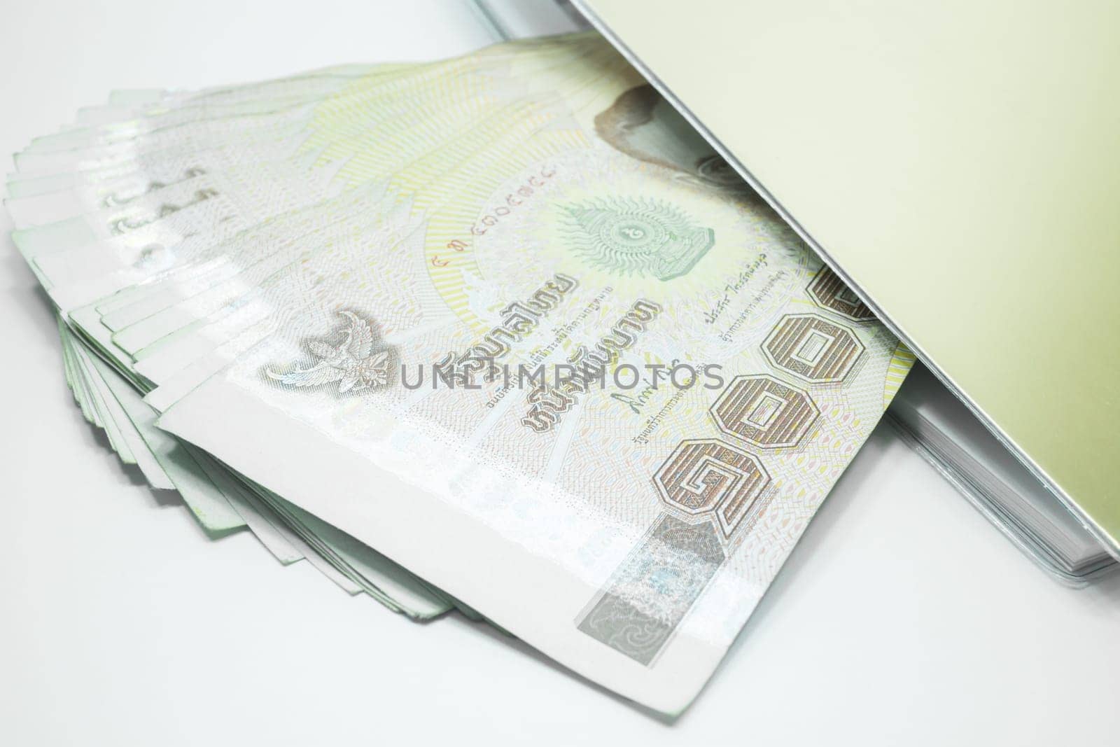Thailand banknotes arranged in set and note book
