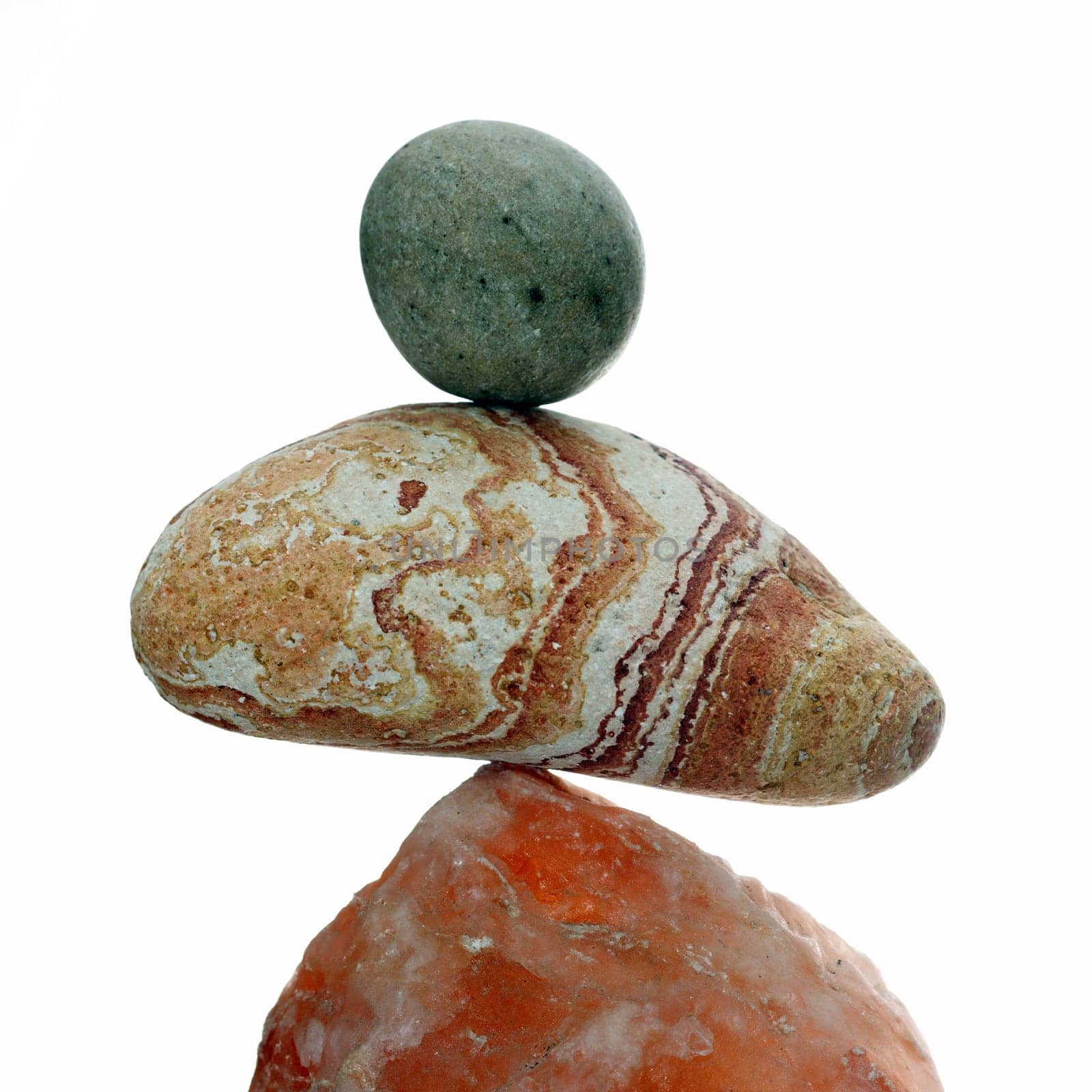 Details of a stone balance isolated on white background.