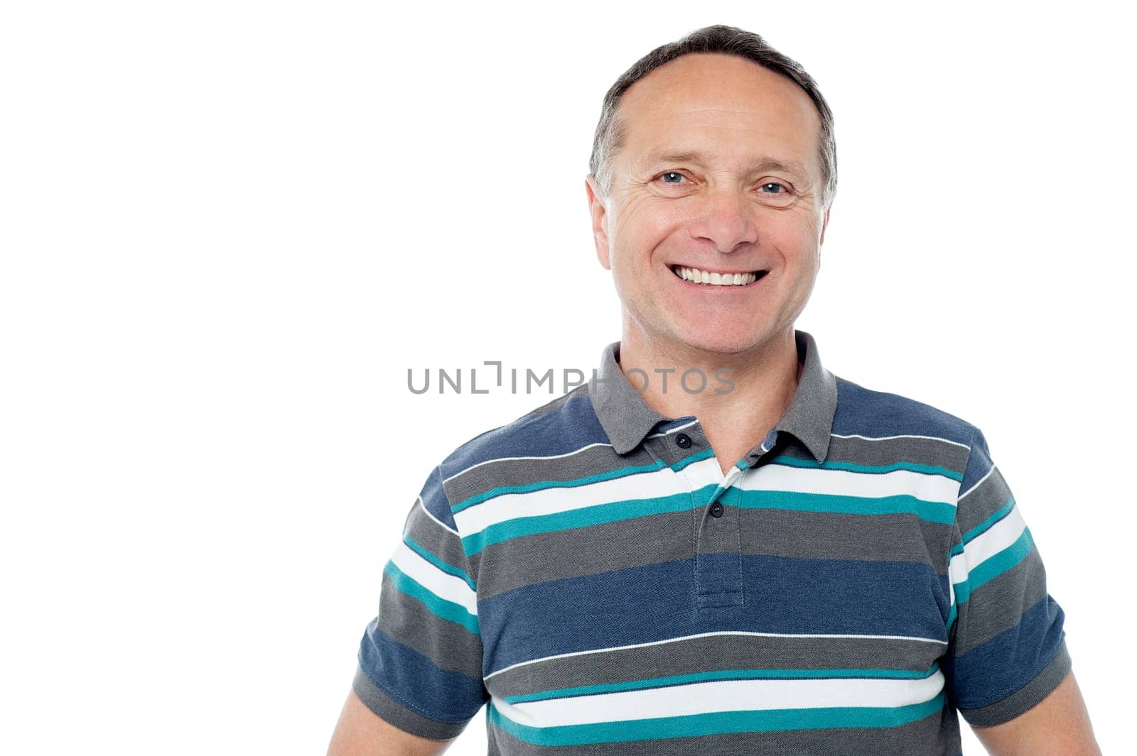 Happy old man posing casually to the camera