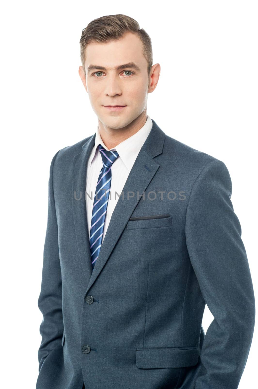 Handsome young executive posing to the camera