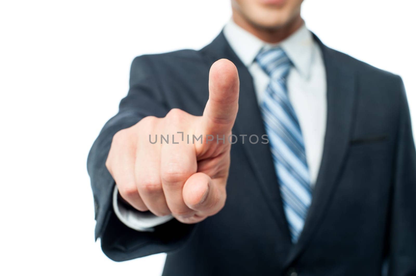 Cropped image of a businessman pointing his finger towards camera