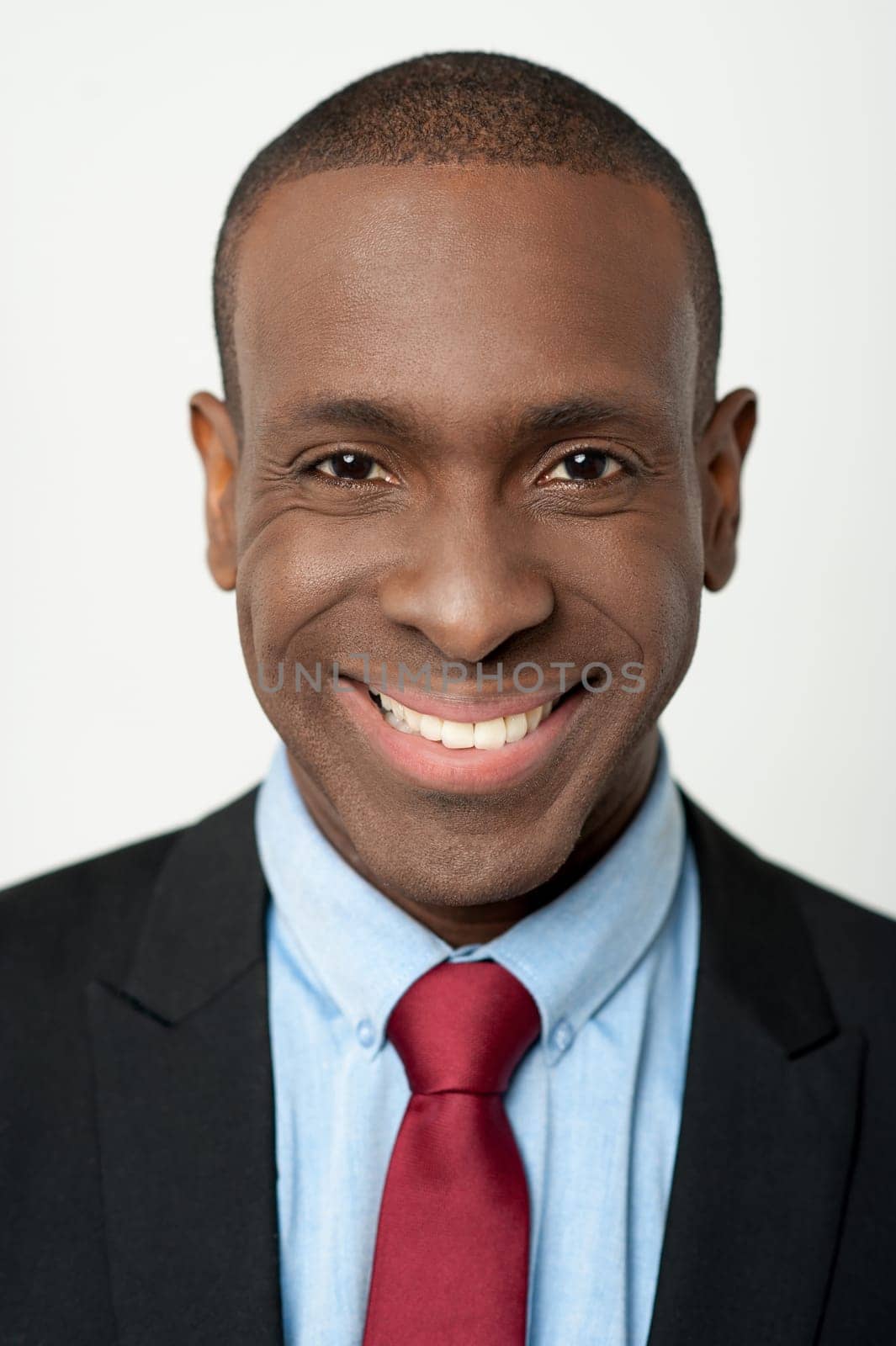 Close up image of a young smiling business professional