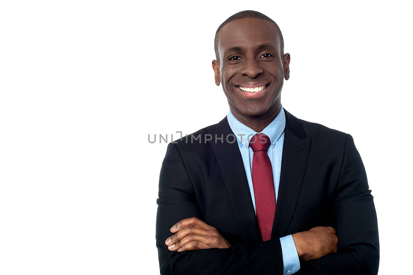 Smiling young professional posing to camera over white