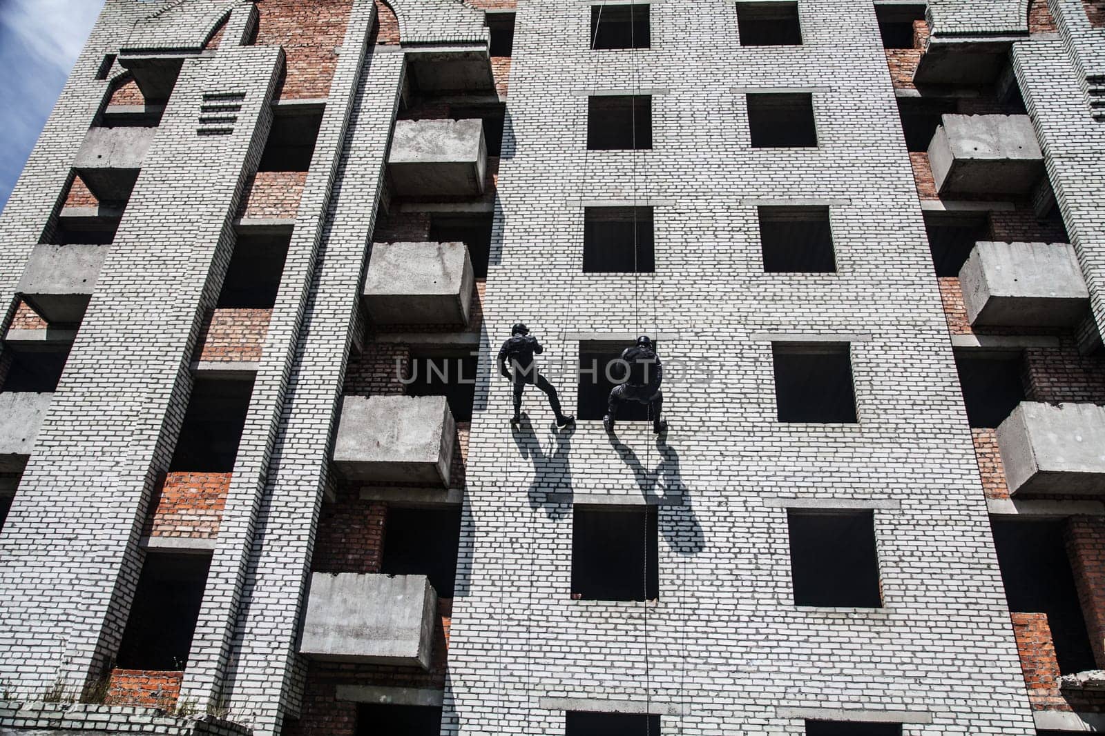 Spec ops police officer SWAT during assault operation