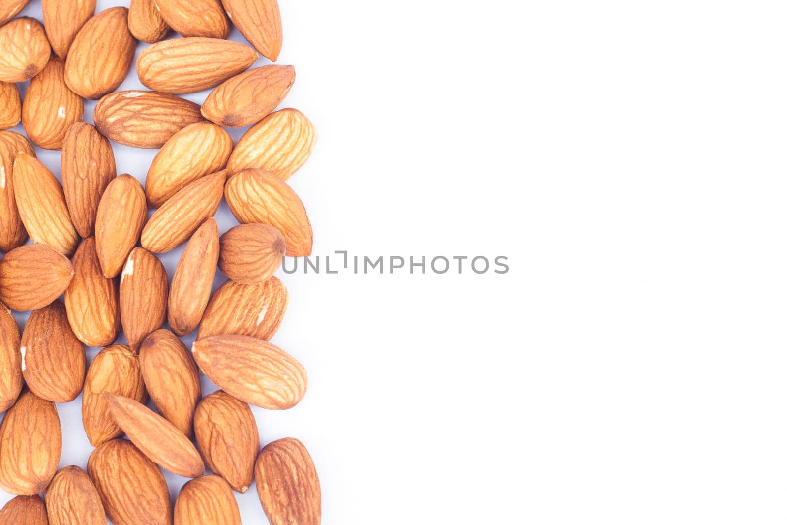 Almond nuts isolated on white background, stock photo