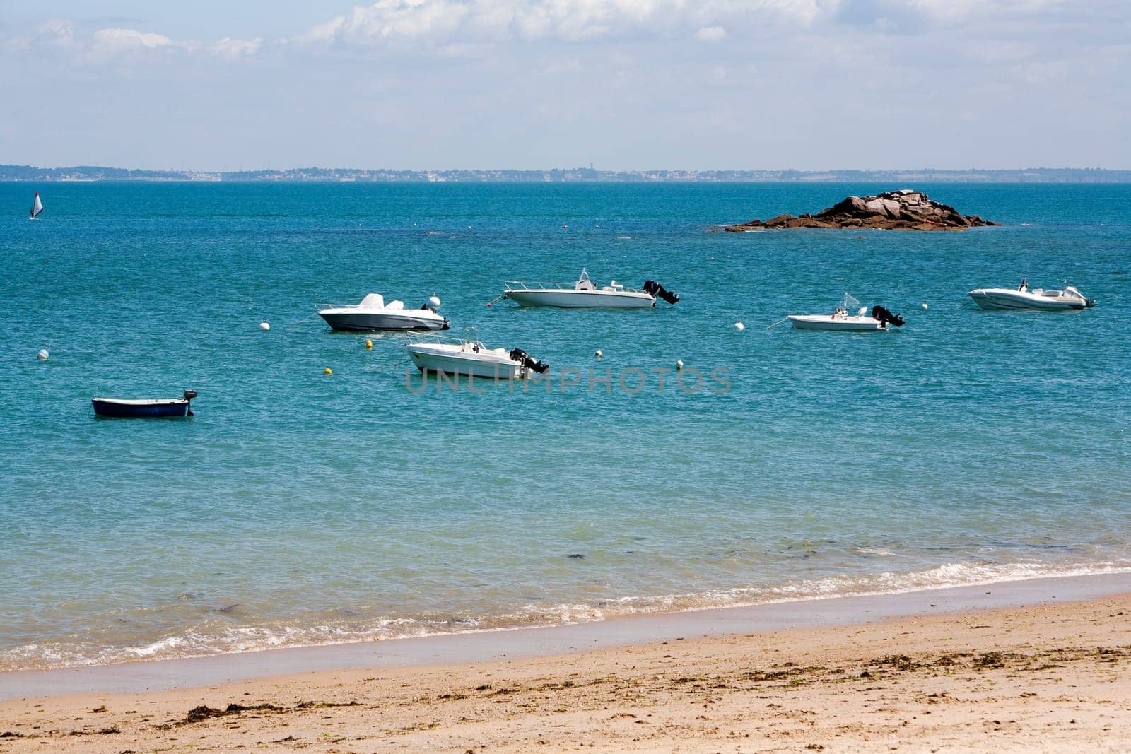 White motorboats moored on sea at Noirmoutier island in France