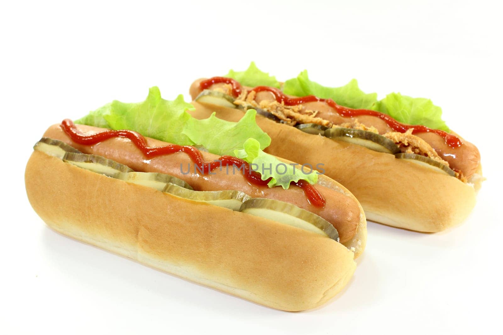 various hot dog's against a white background