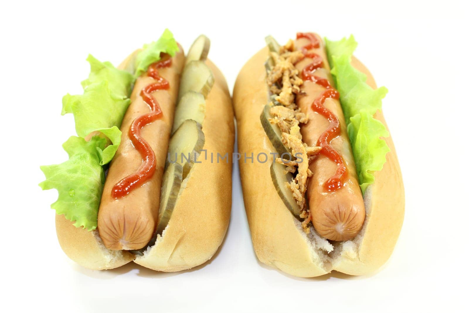 various hot dog's against a white background
