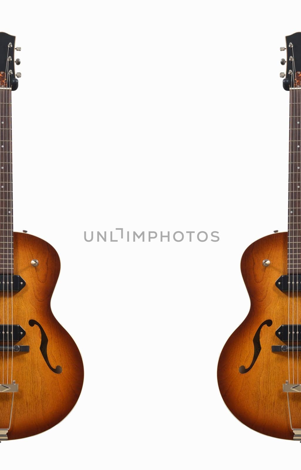 two guitars on white background