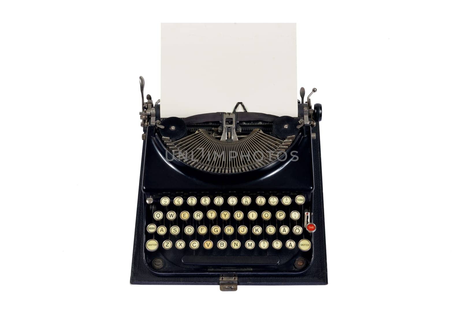 old typewriter with a blank sheet of paper.