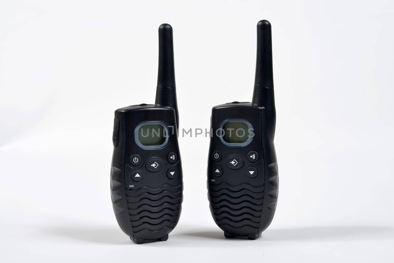 2 walkie talkie on a white surface.