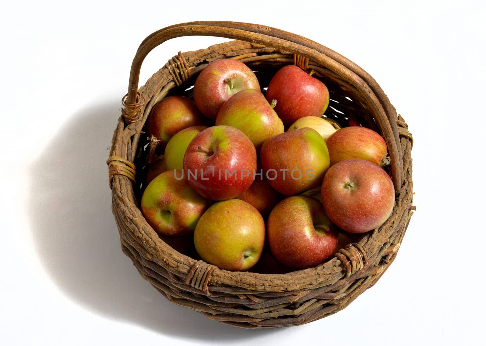 Basket of Apples on the white background