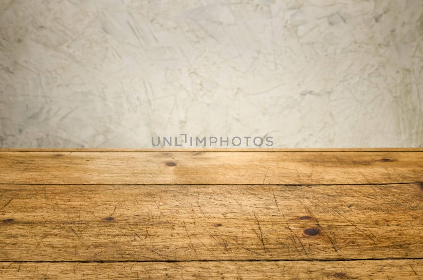 Old wooden boards in front of a rustic wall