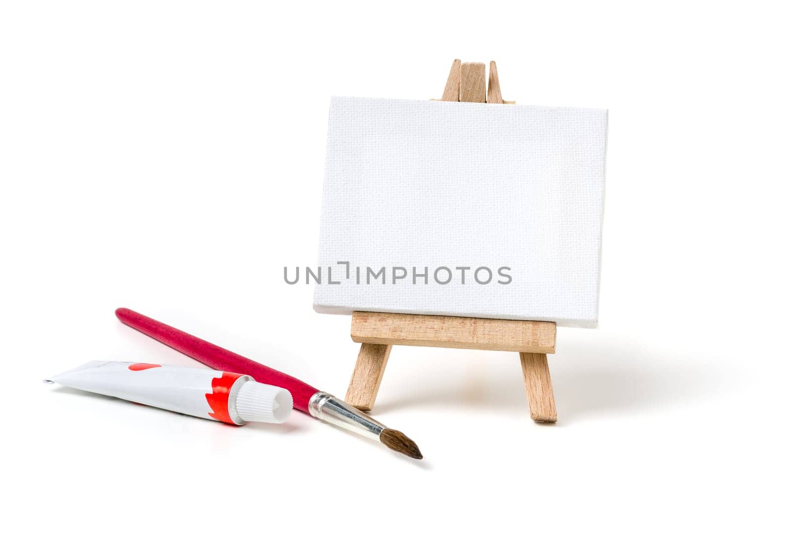 Easel with empty canvas against a white background