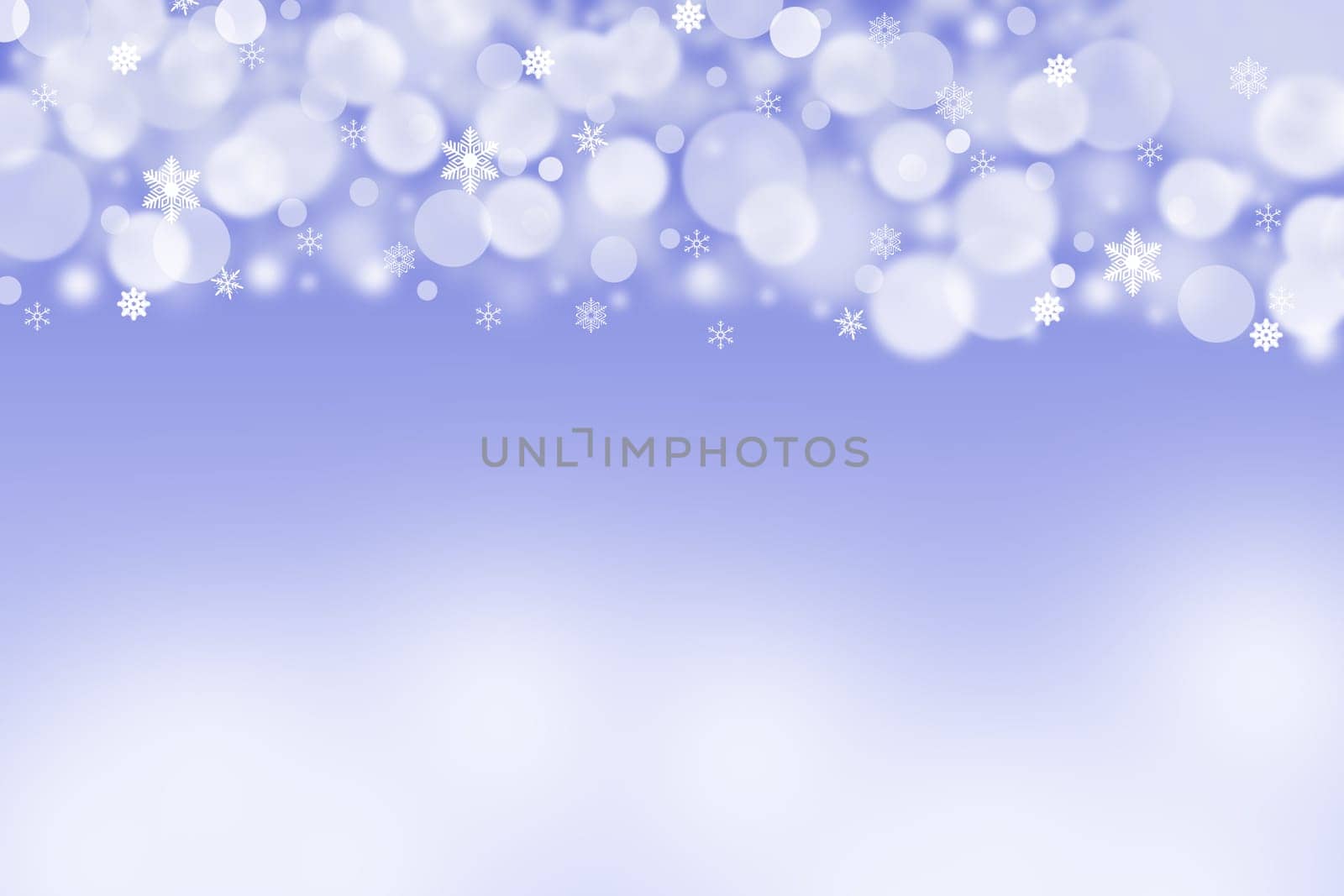The white and grey blurred balls and snowflakes on a blue background. Balls are placed on the top of the picture. The background is downward lighter.