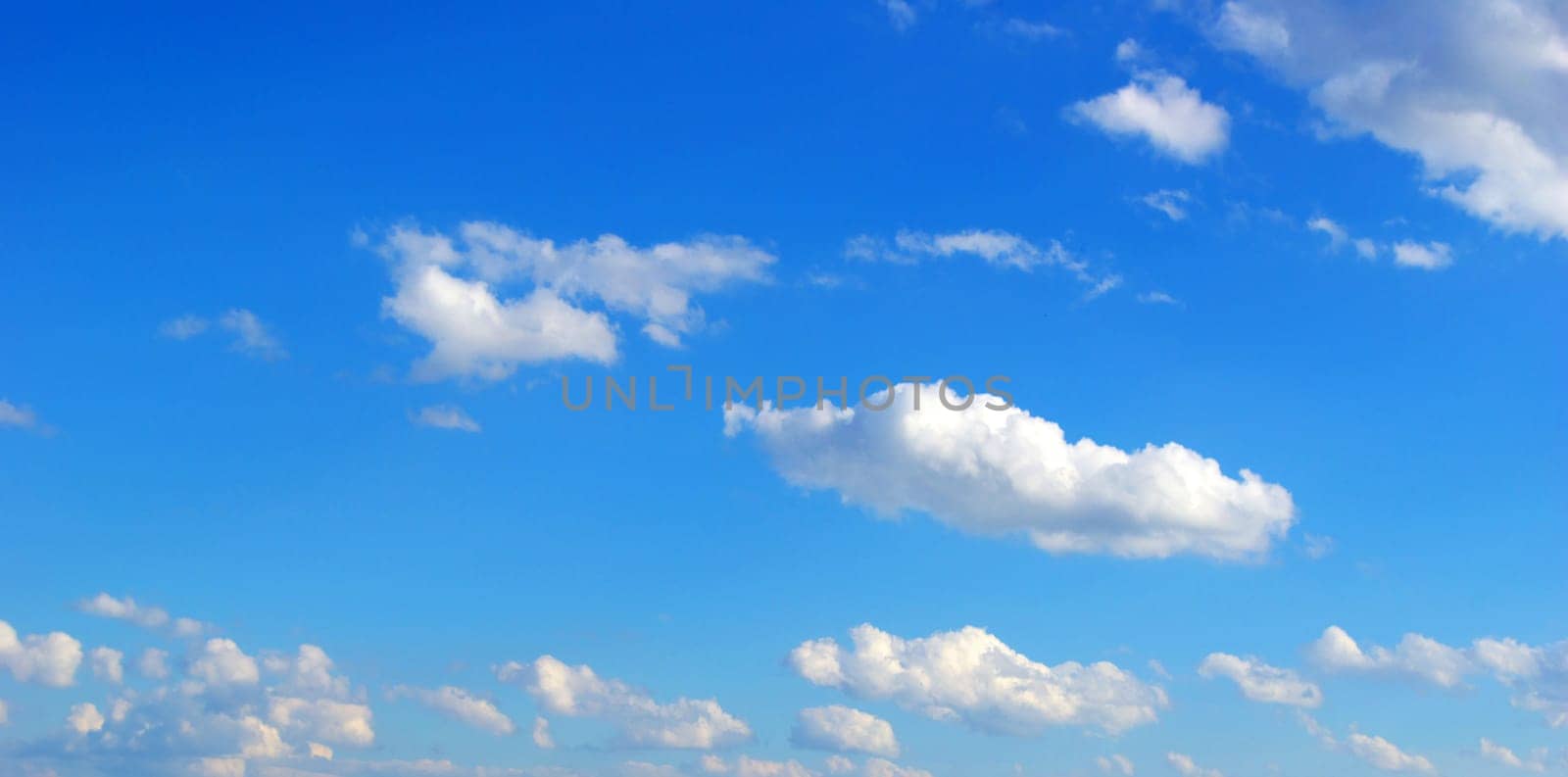 Blue Sky background with tiny clouds
