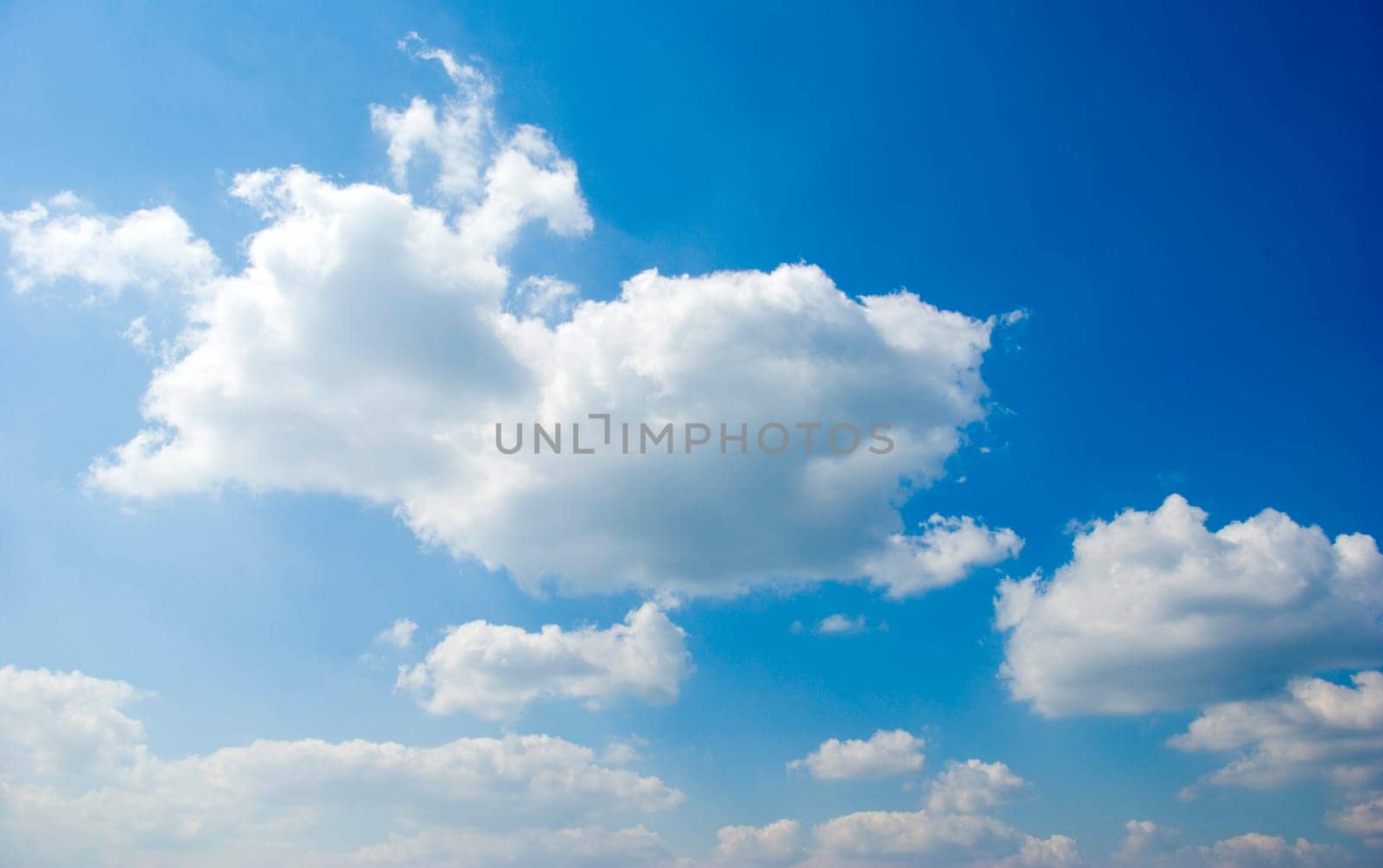 Blue Sky background with tiny clouds