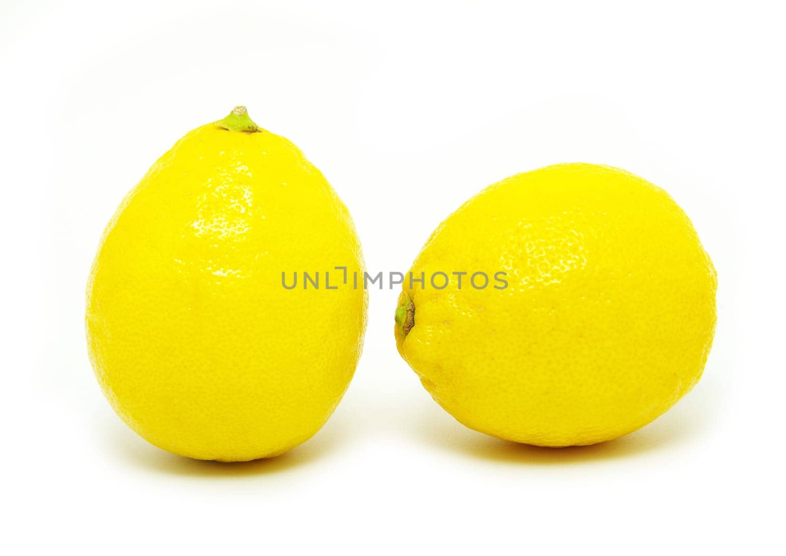 yellow fresh lemons isolated on a white