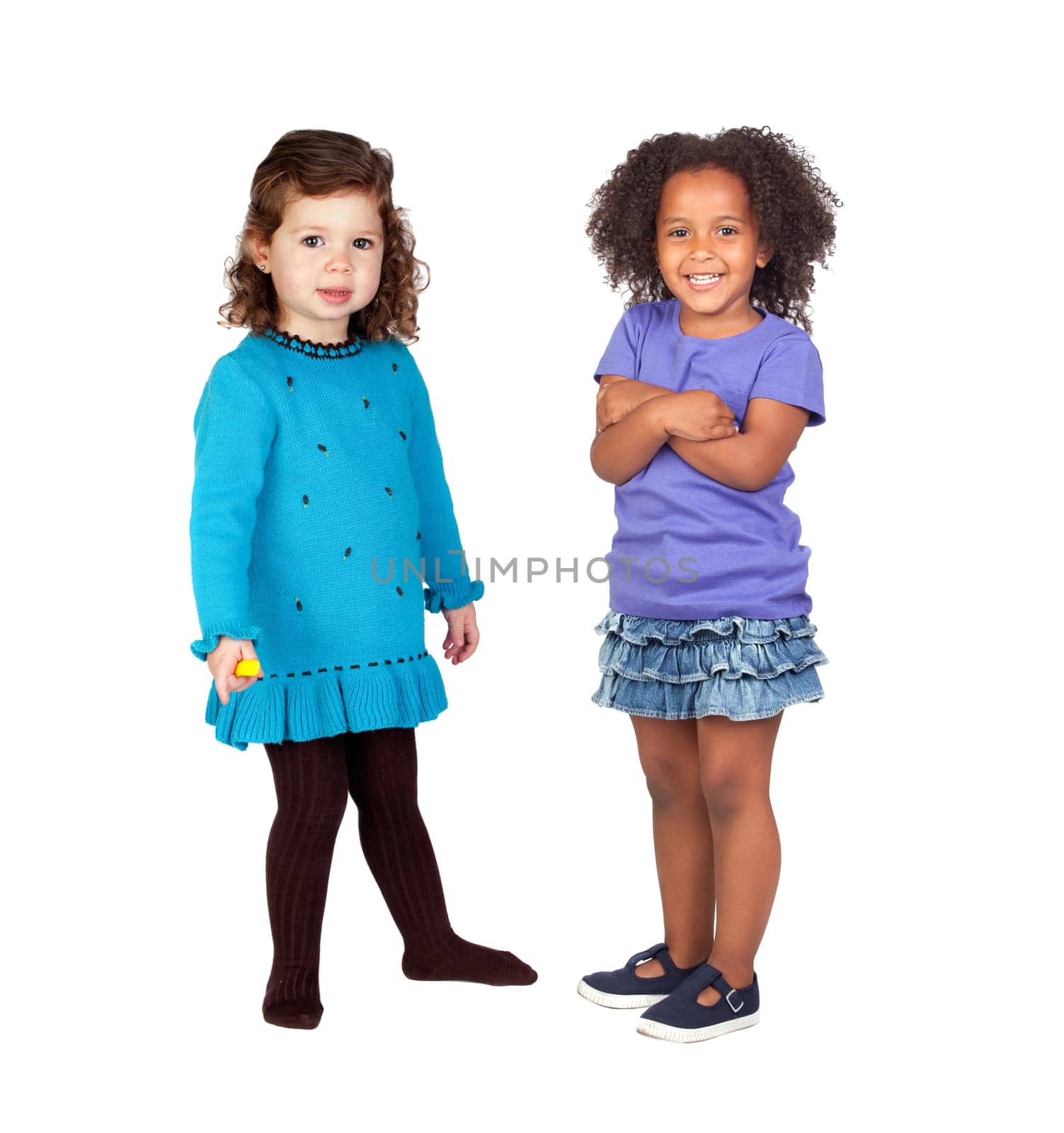 Two adorable little girls isolated on a white background