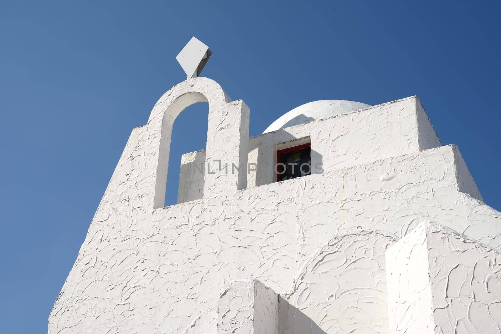 Top of traditional white plaster building