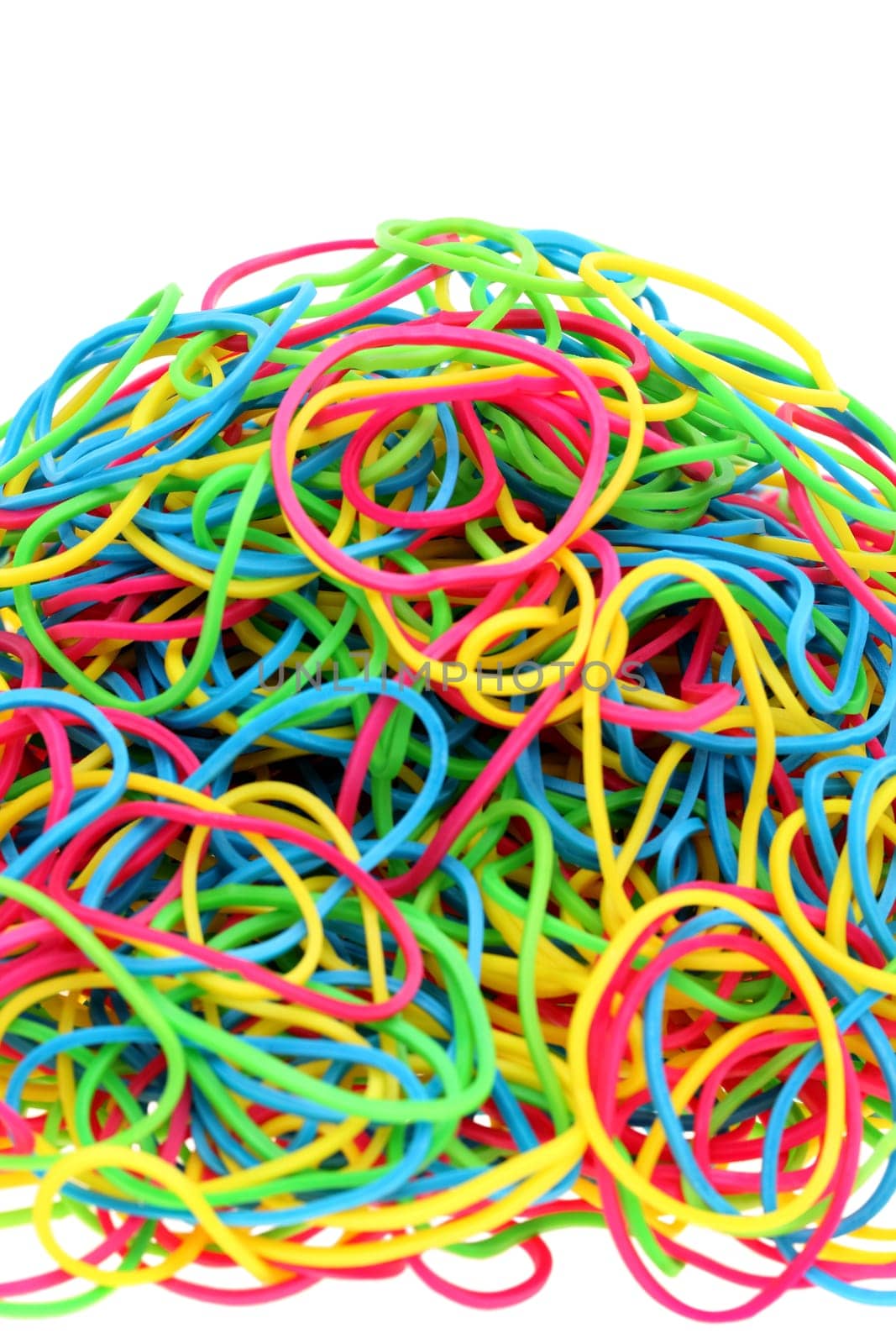 Colorful rubber bands on white background