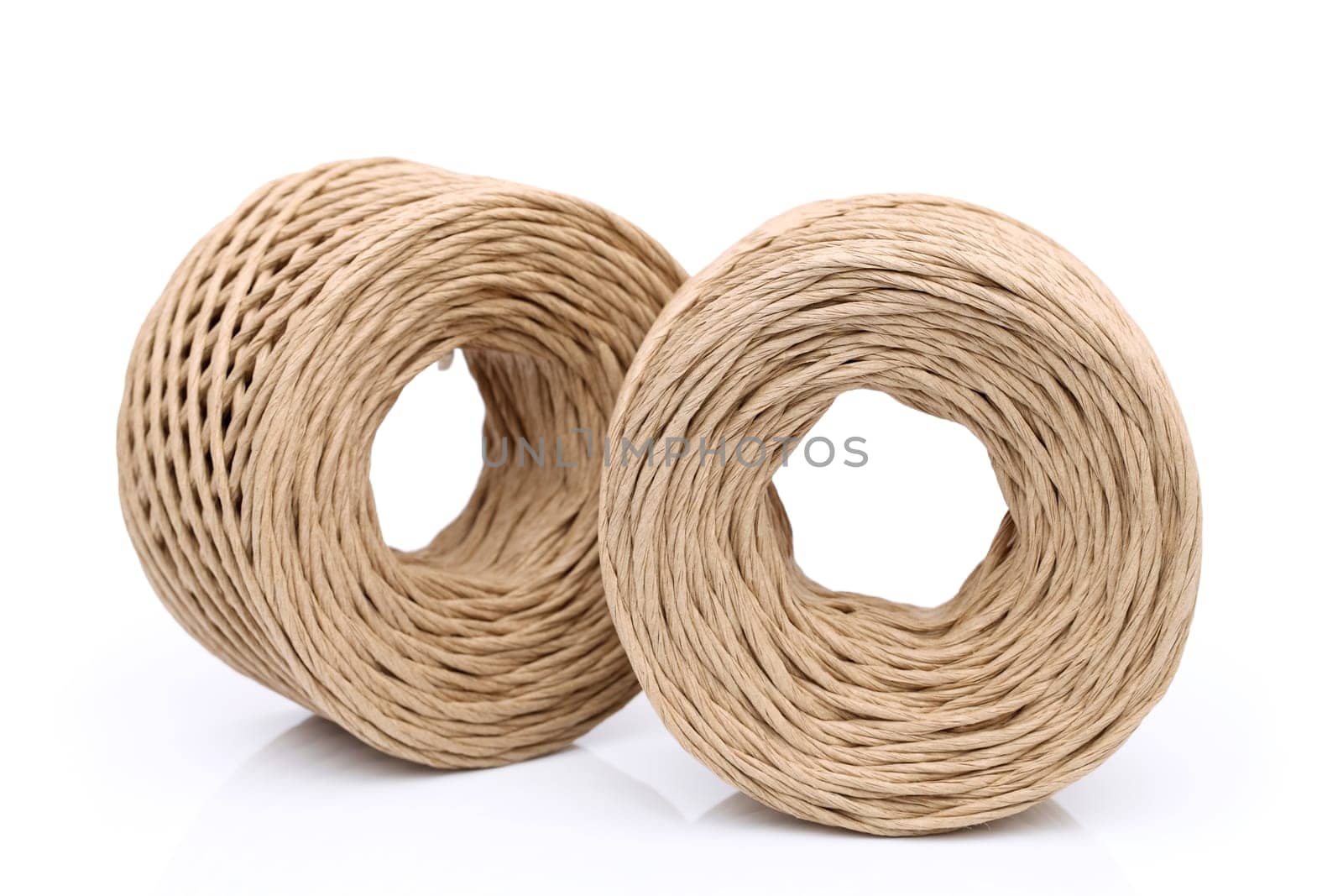 thread made of paper on white background