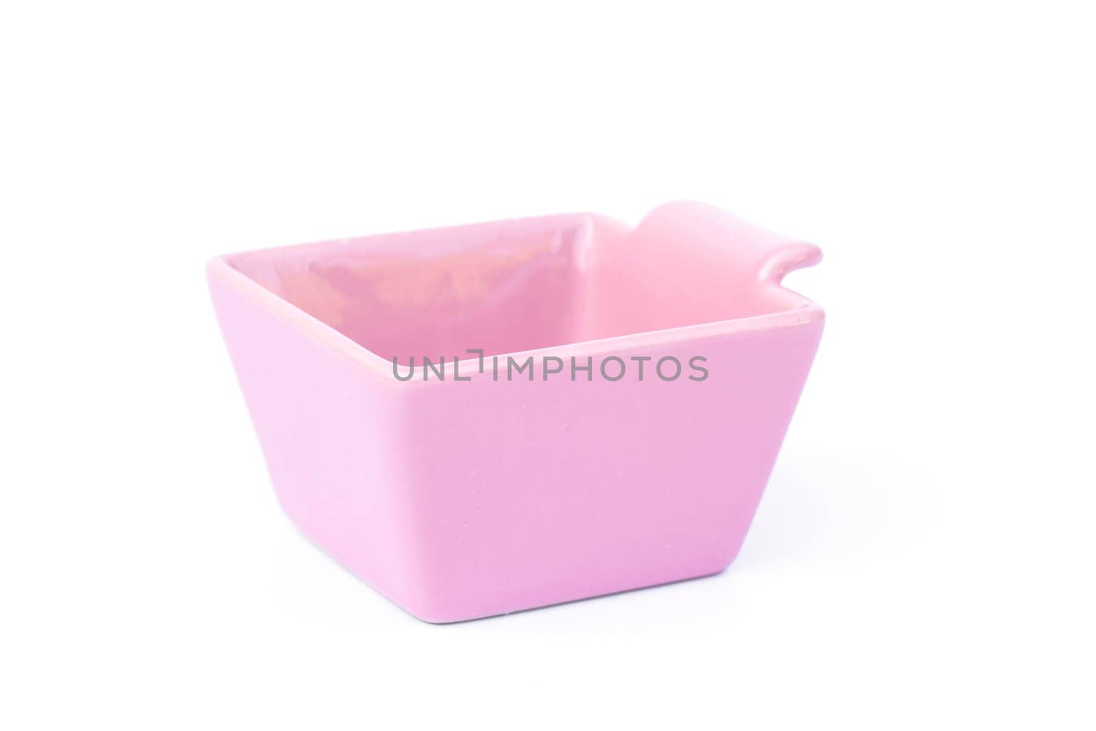 Pink ceramic bowl isolated on white background, stock photo