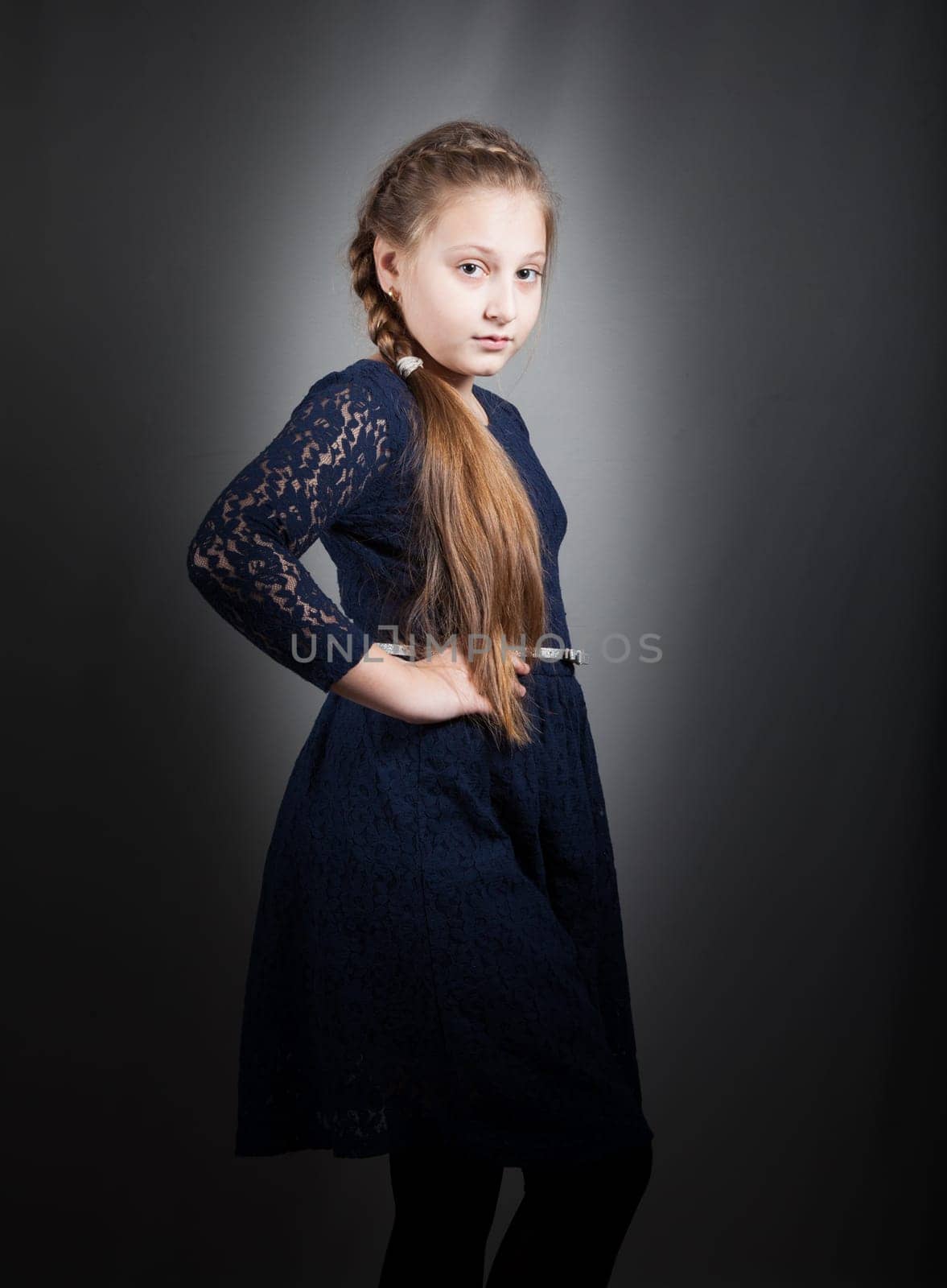 Portrait of a 10 year old girl, studio shot.