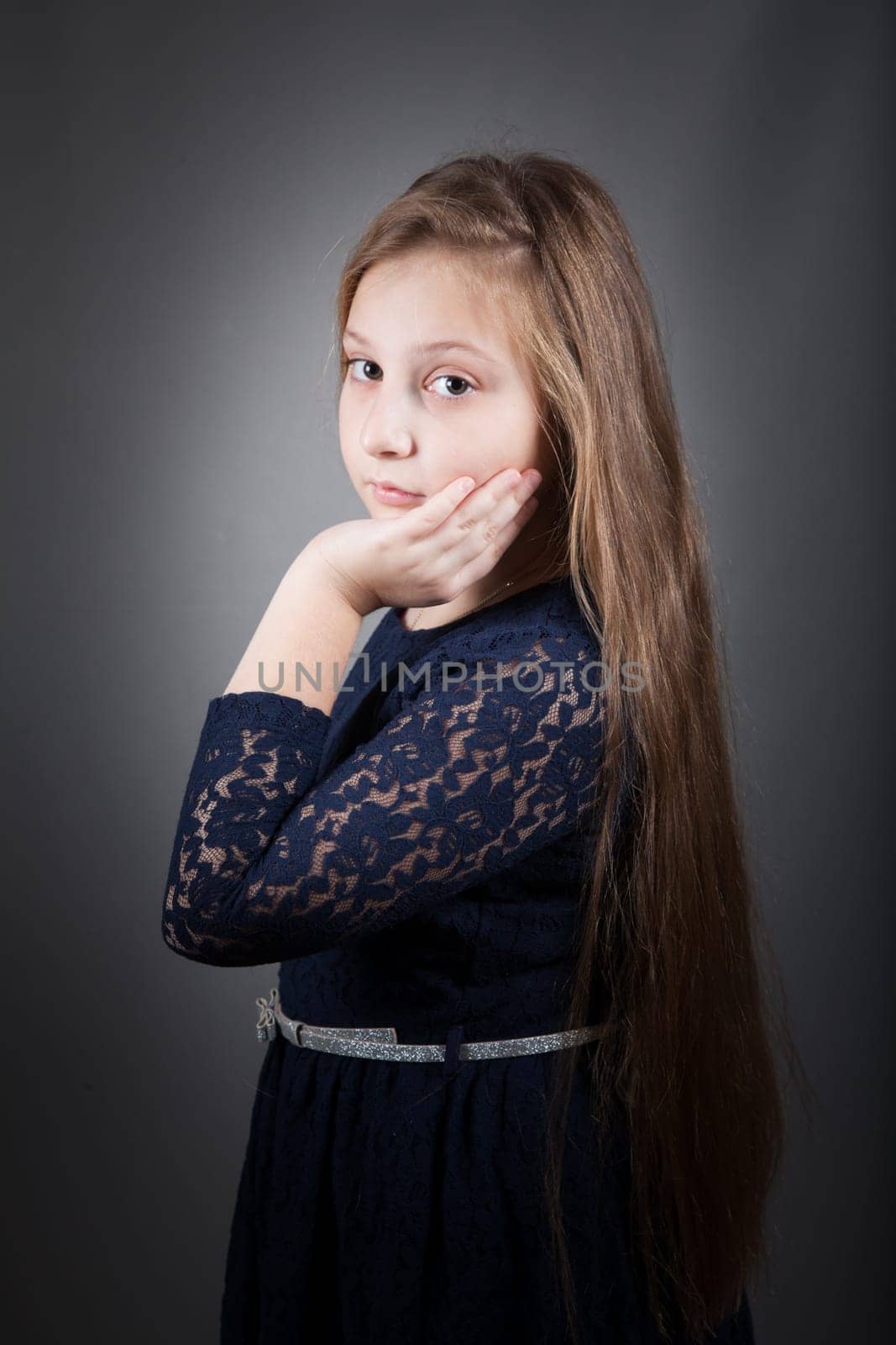 Portrait of a 10 year old girl, studio shot.