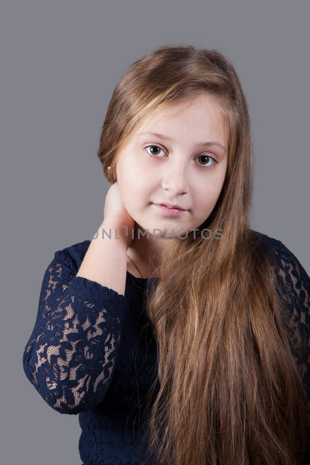 Portrait of a 10 year old girl, studio shot.