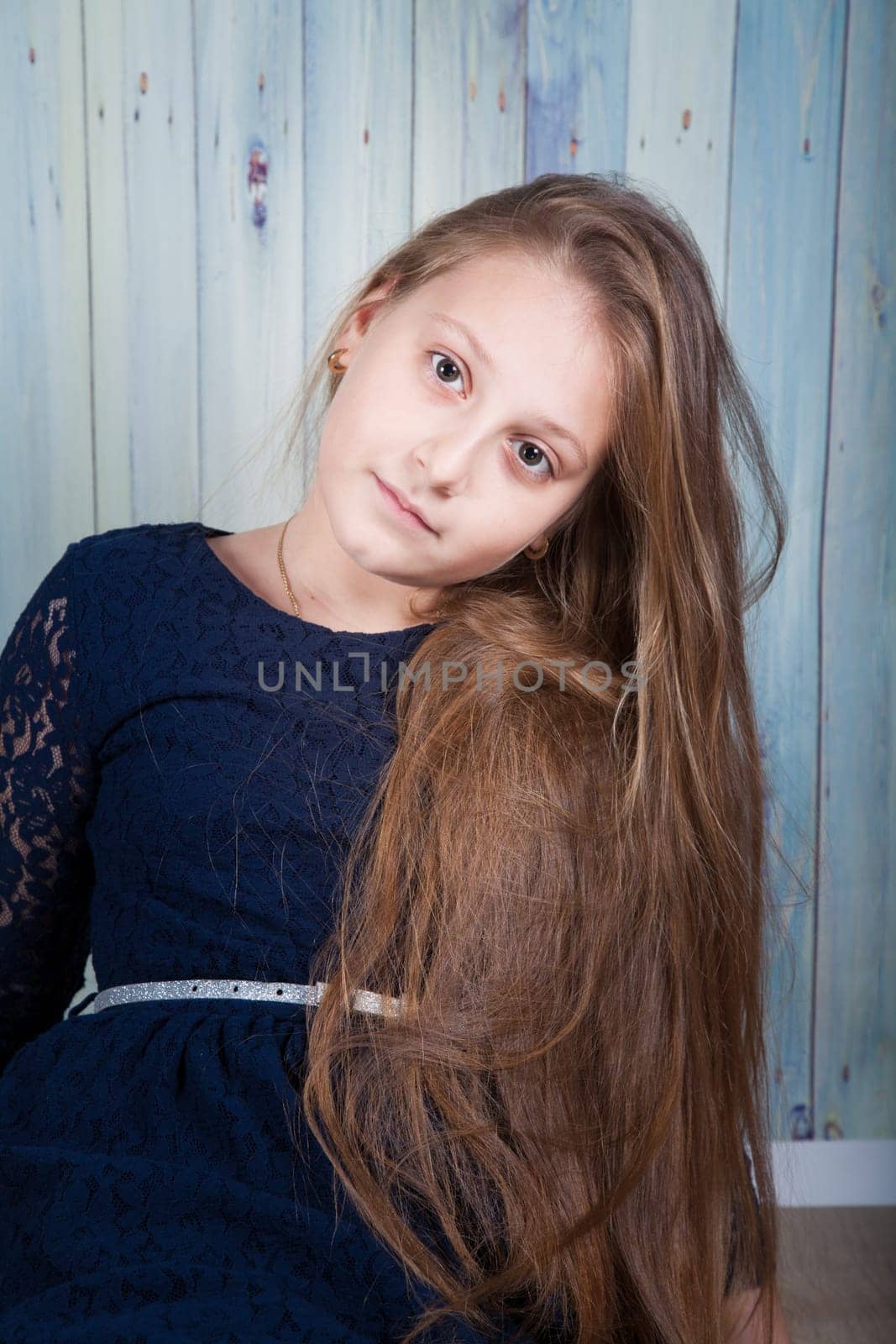 Portrait of a 10 year old girl, studio shot.