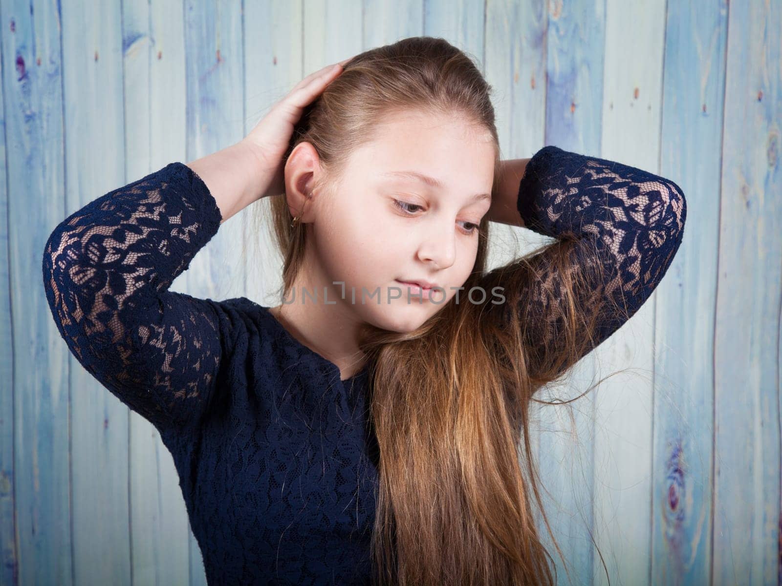 Portrait of a 10 year old girl, studio shot.