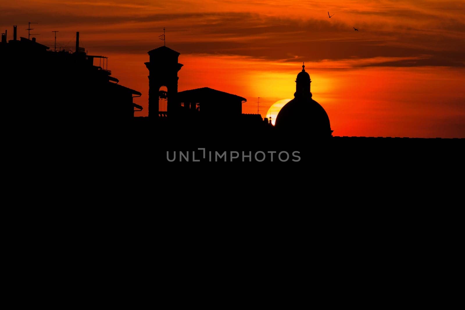 sunset over the ponte vecchio in florence,Italy
