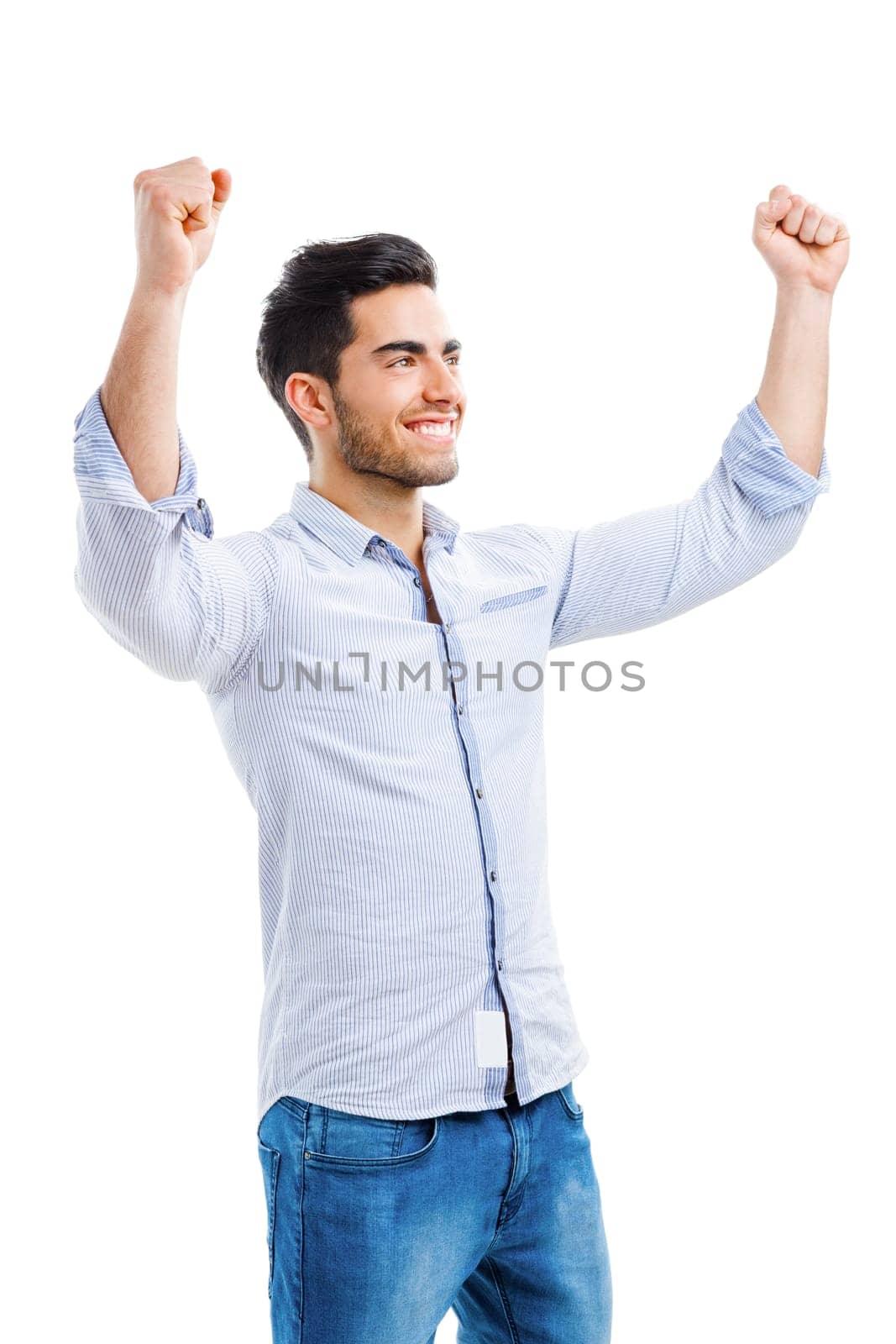 Successful young man with arms open, isolated over white background