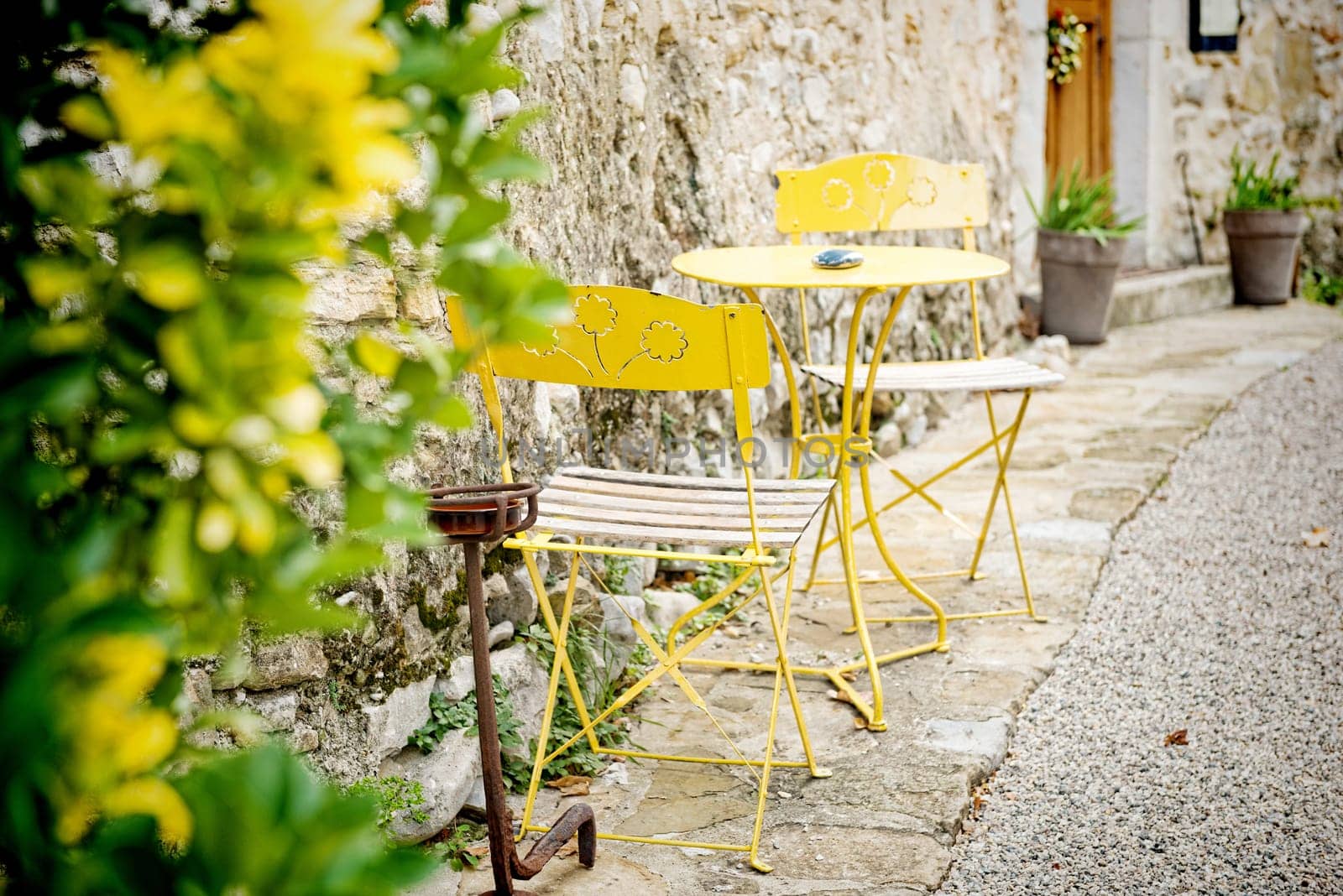 a french antique garden lounge yellow metal