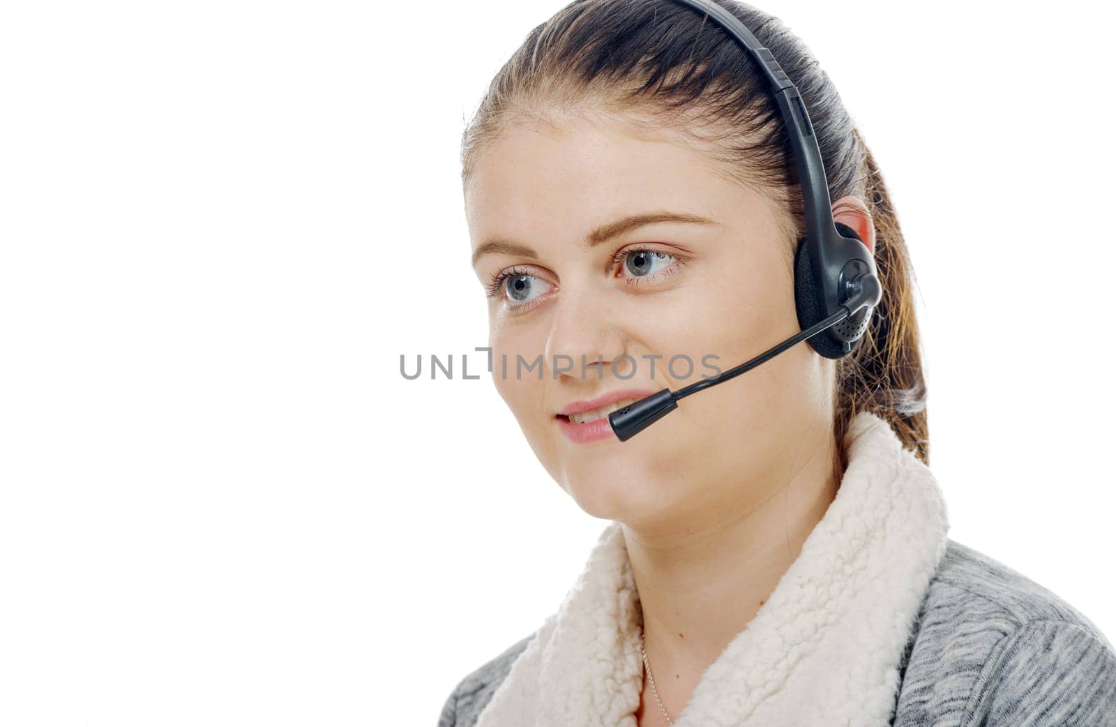 a portrait of smiling cheerful support phone operator in headset.