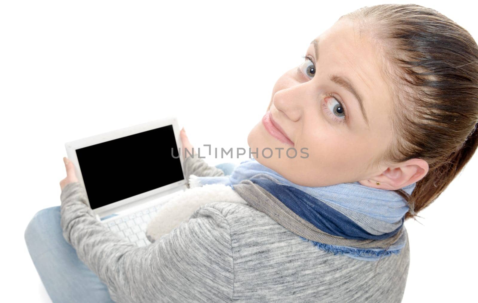 a portrait of beautiful girl using laptop with black screen
