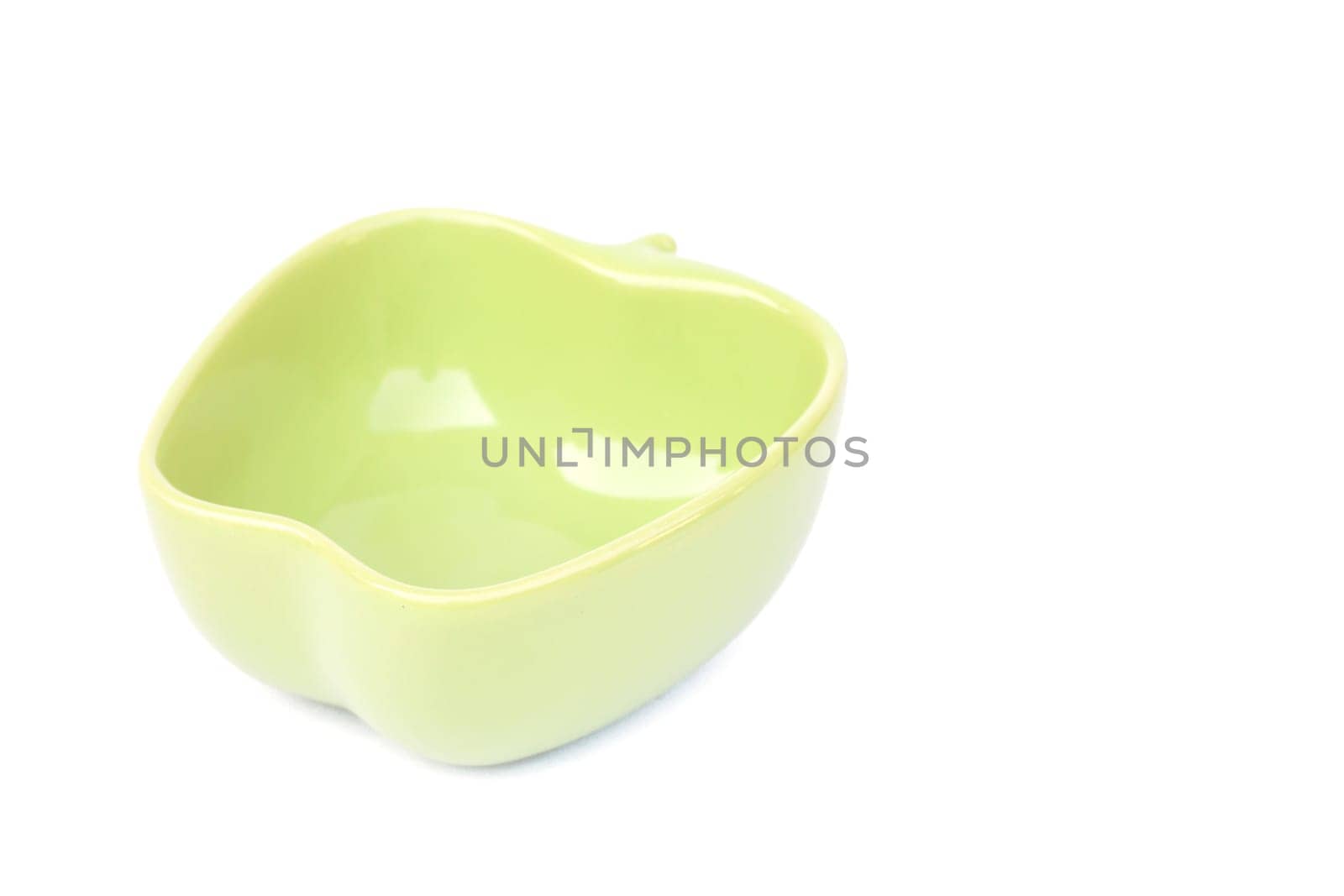 Green ceramic bowl isolated on white background, stock photo